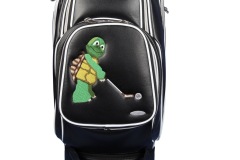 Golfbag mit golfspielender Schildkröte